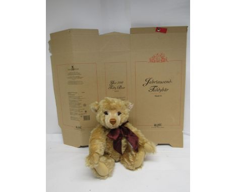 A Steiff 670374 limited edition Millennium mohair teddy bear with plastic eyes, stitched nose and mouth, growler, gold colour