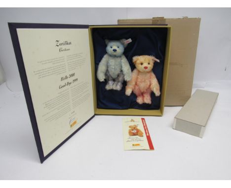 A boxed Steiff limited edition 67037 Hello 2000 Goodbye 1999 teddy bear set, comprising two blue and pink tipped mohair bears