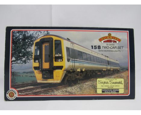 A boxed Bachmann Branch-Line 00 gauge model railway 31-503 Class 158 two-car DMU set in BR Regional Railways livery, storage 