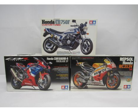 Three Tamiya Motorcycle Series 1:12 scale Honda motorcycle plastic model kits to include 14066 Honda CB750F Custom Tuned, 141