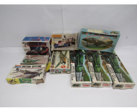 A collection of vintage plastic model kits to include Airfix 06448 1:25 scale Black Belt, R502 00 scale Evening Star locomoti