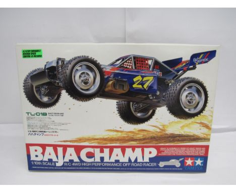 A Tamiya 1:10 scale 58221 Baja Champ radio control 4WD high performance off road racer plastic model kit (contents unchecked)