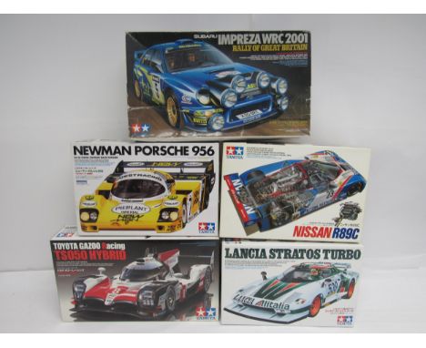 Five Tamiya 1:24 scale racing car plastic model kits to include 24093 Nissan R89C, 25210 Lancia Stratos Turbo, 24049 New Man 