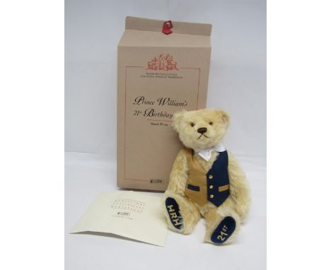 A boxed Steiff limited edition 661198 Prince William's 21st Birthday Bear, the articulated blonde mohair teddy bear with plas