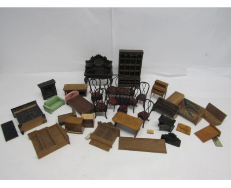 A collection of early 20th Century and later dolls house furniture including bentwood suite of sofa and seven chairs, writing