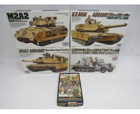 Four Tamiya Military Miniature Series 1:35 scale plastic model kits to include 35269 M1A2 Abrams Operation Iraqi Freedom, 352