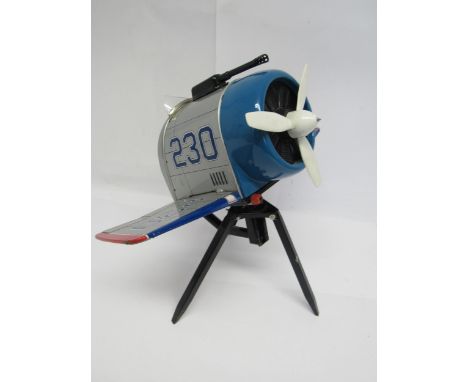 A Suzuki &amp; Edwards (Japan), battery operated tinplate Interceptor fighter plane toy, raised on tinplate tripod stand with