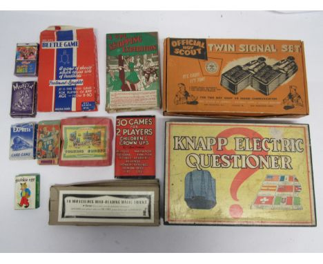 A collection of vintage toys and games including Official Boy Scout Twin Signal Set, Knapp Electric Questioner, UPL Shopping 