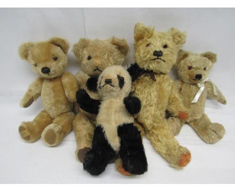 Four vintage careworn golden mohair teddy bears including two Merrythought examples (one missing eye), together with a vintag