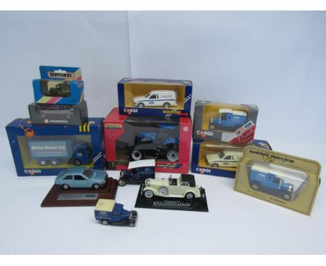 Eight assorted boxed diecast vehicles to include Britains 1:32 scale 42112 New Holland T8040 Tractor (lacking box inner), Sch
