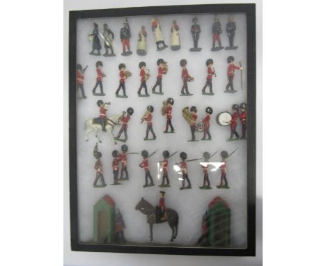 A collection of Bitains hand painted lead figures including Salvation Army woman with tambourine, military bandsmen, mounted 