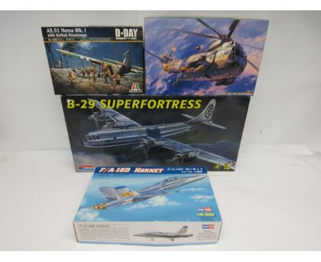 Three 1:48 scale military aircraft plastic model kits to include Monogram 75-5718 B-29 Superfortress, Hobby Boss 80322 F/A-18