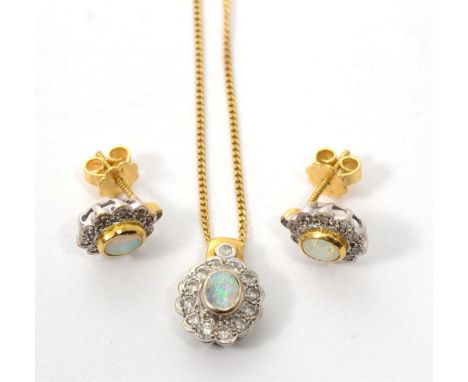 An 18 carat gold opal and diamond necklace and earring suite, an oval cabochon opal in a rubbed over setting within a border 