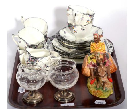 A Beswick figure Susie Jamaica; a pair of glass dishes with silver mounts and a Shelley tea service