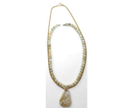 A carved jade pendant, depicting a bird and dragon, measures 4.5cm by 3cm, to a box chain, length 59cm and a jade bead neckla