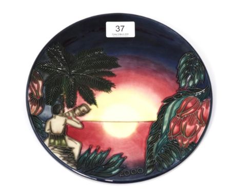 A modern Moorcroft pottery plate in the Birth of Light 2000 year plate pattern, 278/2000, with painted and impressed marks, 2