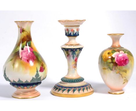 Two Royal Worcester floral painted blush ivory vases together with a Royal Worcester Hadley ware candlestick (a.f.)