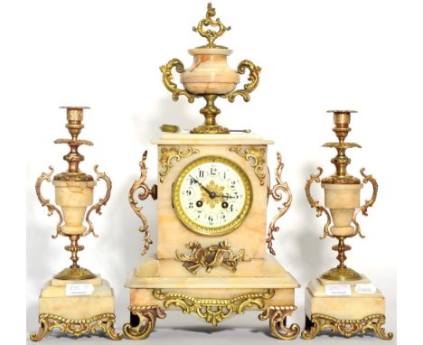 A French alabaster and gilt metal striking mantel clock garniture