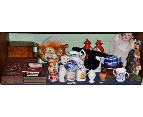 A glass rolling pin; pressed glassware; pottery moulds; Copeland blue and white teapot; Punch & Judy doorstops; bisque doll (