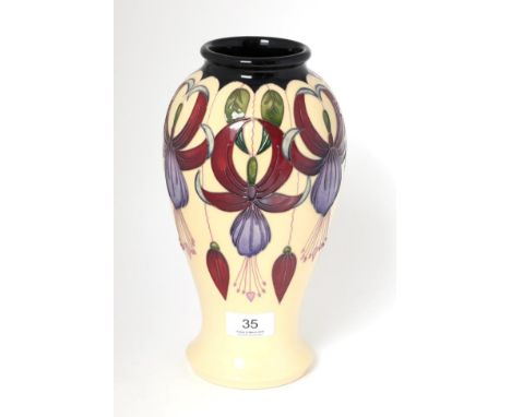 A modern Moorcroft pottery Sunshine Chandelier pattern vase by Rachel Bishop, 86/100, with painted and impressed marks, 26cm 