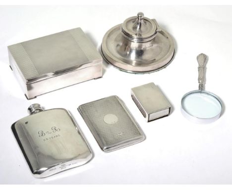 An engine turned silver cigarette box, Birmingham 1962; a silver inkwell, Birmingham 1907; an engine turned match box holder,