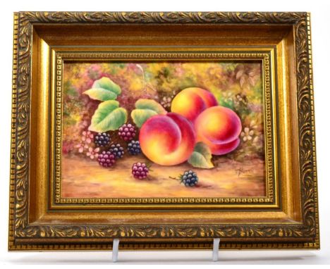 A Royal Worcester fruit painted plaque signed J Skerrett, framed, 24.5cms by 20cms (measured in frame)