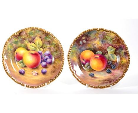 Two Royal Worcester fruit painted plates, one signed B Cox, the other signed J Skerrett, 15cm eachB Cox with paint scratches,