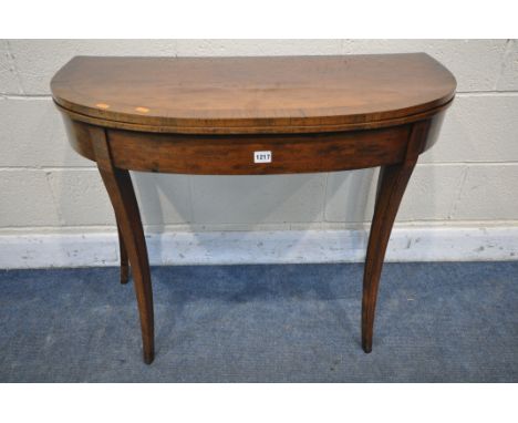 A GEORGIAN FRUITWOOD AND ROSEWOOD CROSSBANDED CARD TABLE, the fold over top is enclosing a green baize playing surface, on sp