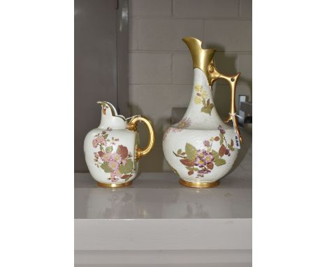 TWO ROYAL WORCESTER IVORY GROUND EWERS, both printed and painted with sprays of flowers, the taller ewer stamped 'Patent Meta