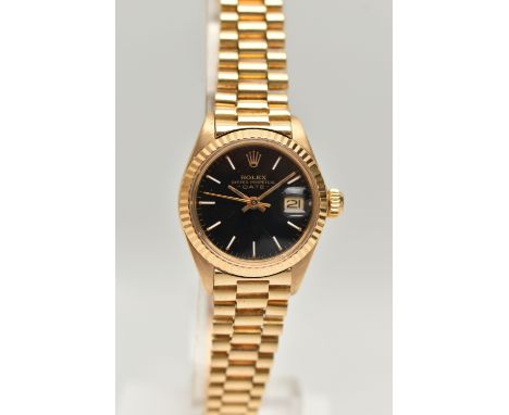 A 1976 ROLEX OYSTER PERPETUAL 26MM DATE WRISTWATCH, ref. 6917, black dial with baton markers and date window to three o'clock