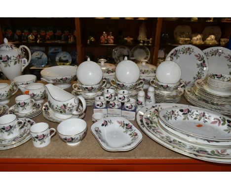 A ONE HUNDRED AND SIX PIECE WEDGWOOD HATHAWAY ROSE DINNER SERVICE, comprising three tureens (one missing lid, two cracked, cr