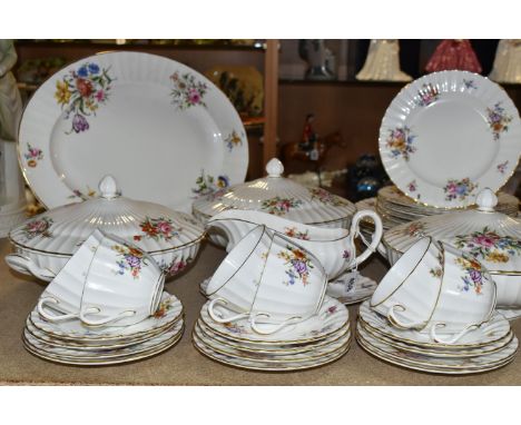 ROYAL WORCESTER 'ROANOKE' PATTERN DINNERWARE, comprising three circular covered tureens, a large meat plate, gravy jug and st