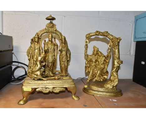 TWO GILT METAL HINDU RELIGIOUS FIGURES, comprising Radha and Krishna swinging together, height 27cm, a group figure of Ram Da