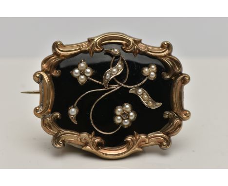 A VICTORIAN MOURNING BROOCH, a large brooch of rectangular form with yellow metal scrolling foliage edging, the centre of the