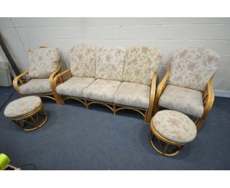 A FIVE PIECE WICKER CONSERVATORY SUITE, comprising of a three-seater sofa, width 174cm x depth 87cm x height 97cm, two armcha
