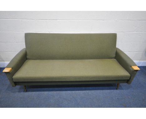 A MID-CENTURY GREEN VELOUR UPHOLSTERED BED SETTEE, with beech armrests, length 203cm x depth 85cm x height 85cm (condition re