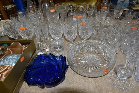 A QUANTITY OF CUT CRYSTAL AND OTHER GLASS WARES, approximately fifty pieces, to include a boxed RCR vase and glass 'pebbles',