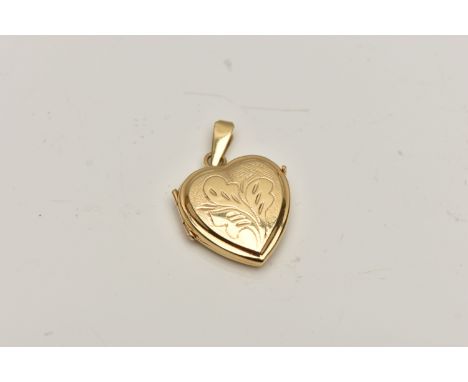 A HEART SHAPED LOCKET, engraved with foliate detail to the front, suspension loop stamped 750, length including suspension lo