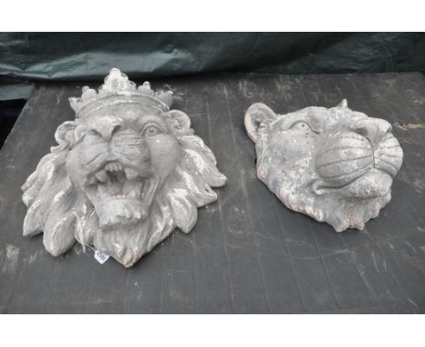 TWO PAINTED FIBREGLASS GARDEN WALL FIGURES of lions that are King and Queen, king measurements, width 55cm x height 63cm