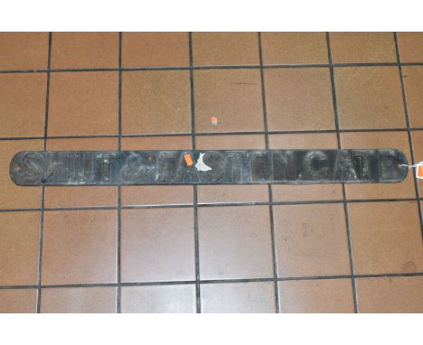 A CAST METAL SIGN, 'Shut &amp; Fasten Gate', length 85cm (1) (Condition report: weathered and rusting)