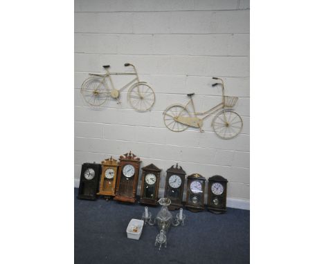A SELECTION OF MODERN WALL CLOCKS, including Acctim, Emperor, etc, along with two wall mounted decorative items of bicycles, 
