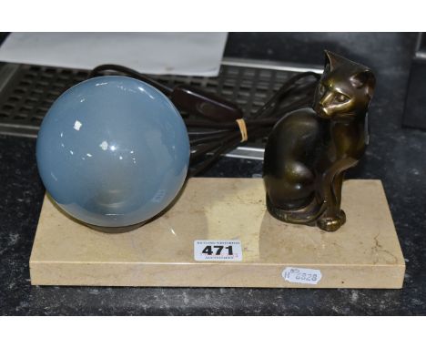 A FRENCH ART DECO TABLE LAMP, featuring a seated cat figure and a blue glass globe shade on a stone base (1) (Condition repor