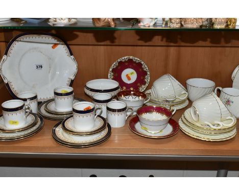 A GROUP OF AYNSLEY AND MINTON TEAWARES, comprising two non-matching Aynsley cups and two saucers with claret and gilt borders