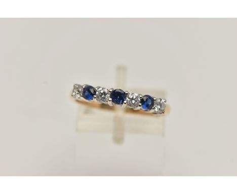 A 14CT GOLD GEM SET RING, three circular cut sapphires and four circular cut cubic zirconia, prong set in white gold, leading