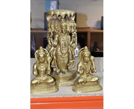 THREE GILT METAL RELIGIOUS HINDU FIGURES, comprising two Lord Hanuman figures, height 17cm, together with a figure of the cos