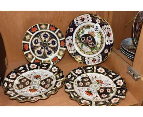 FOUR ROYAL CROWN DERBY CABINET PLATES, comprising a limited edition first in a series of four Christmas plates 1997 1663/1750