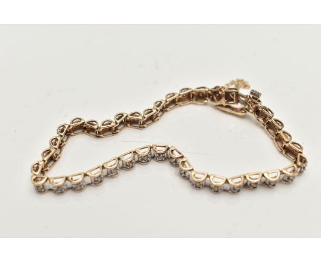 A 9CT GOLD DIAMOND LINE BRACELET, designed as a series of box links each set with a small round brilliant cut diamonds, integ