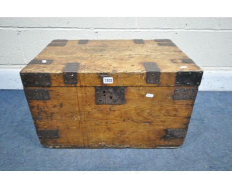 A VINTAGE PINE AND METAL BANDED TRUNK, with metal handles, width 61cm x depth 42cm x height 37cm (condition report:-historica