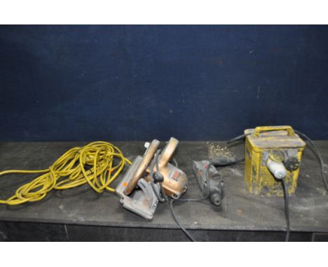 A DRAPER 110V TRANSFORMER, a Bosch GBH-2-SR 110v SDS drill, a vintage Black and Decker 240v Circular Saw and a 110v extension