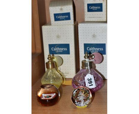 FOUR BOXED PIECES OF CAITHNESS GLASS, comprising two atomisers: one yellow with crackle effect glass, the other pink, a Minia